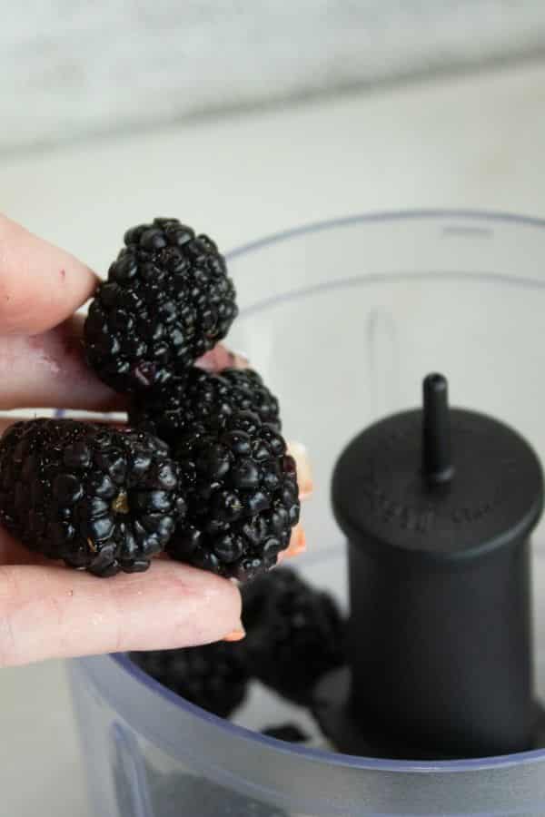 blackberries going into food processor 