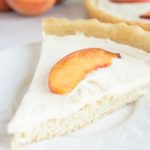slice of peach tart on table