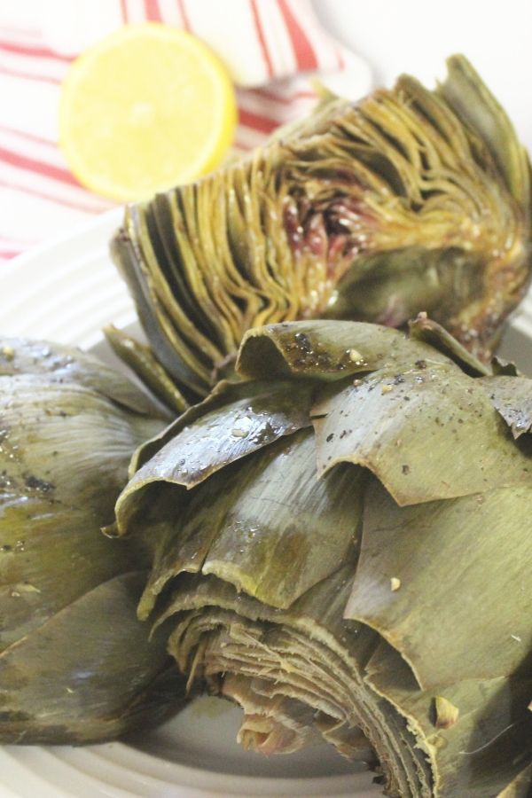 roasted artichokes on a plate 