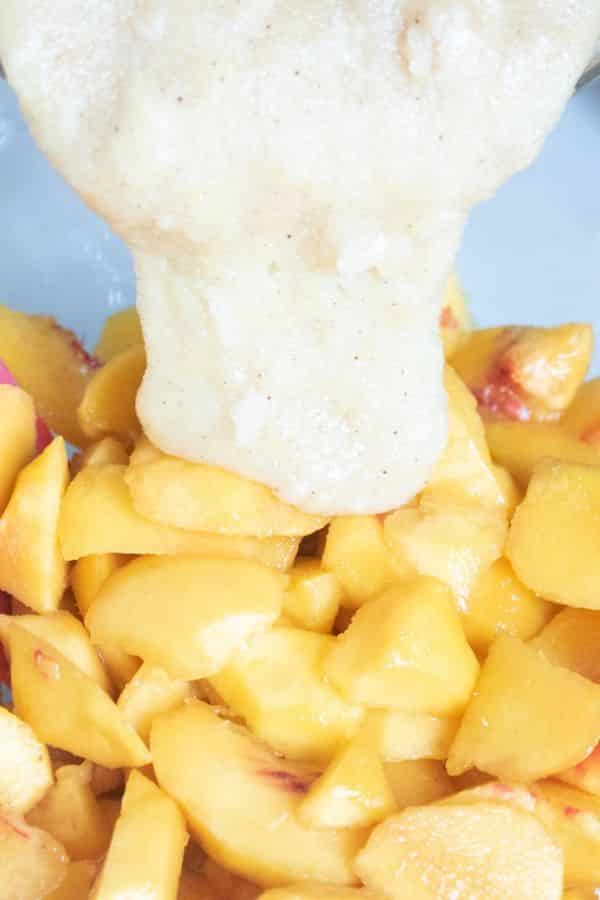 peach filling poured over fresh peaches