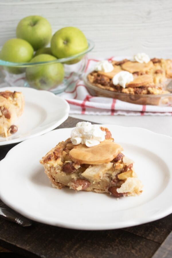 apple almond pie sliced on plates 