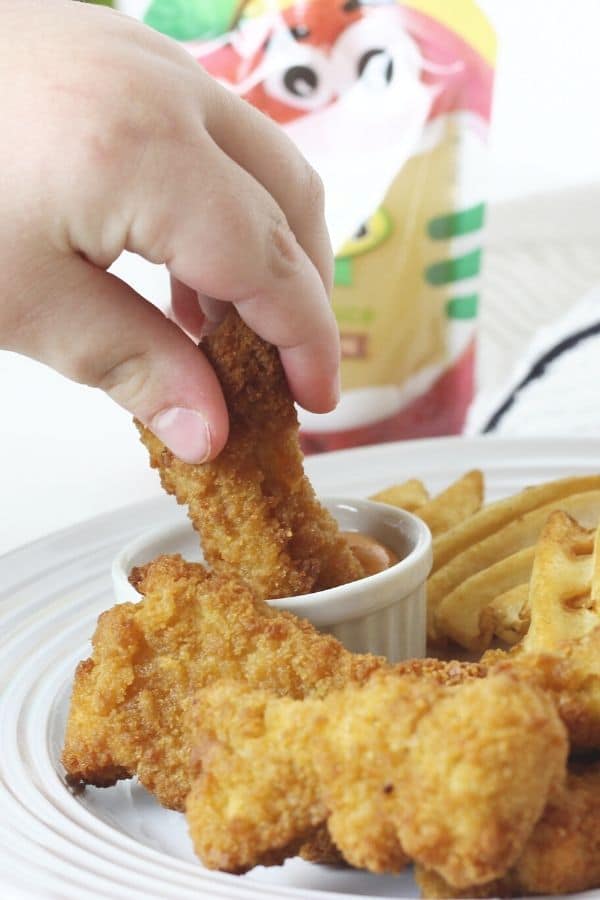 air fried chicken nuggets and fries on plate