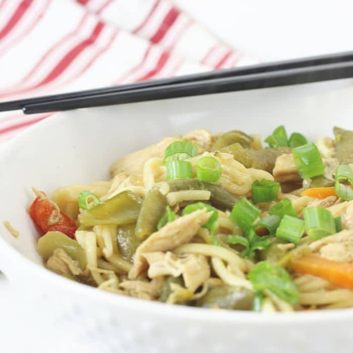 chicken lo mein in a bowl 