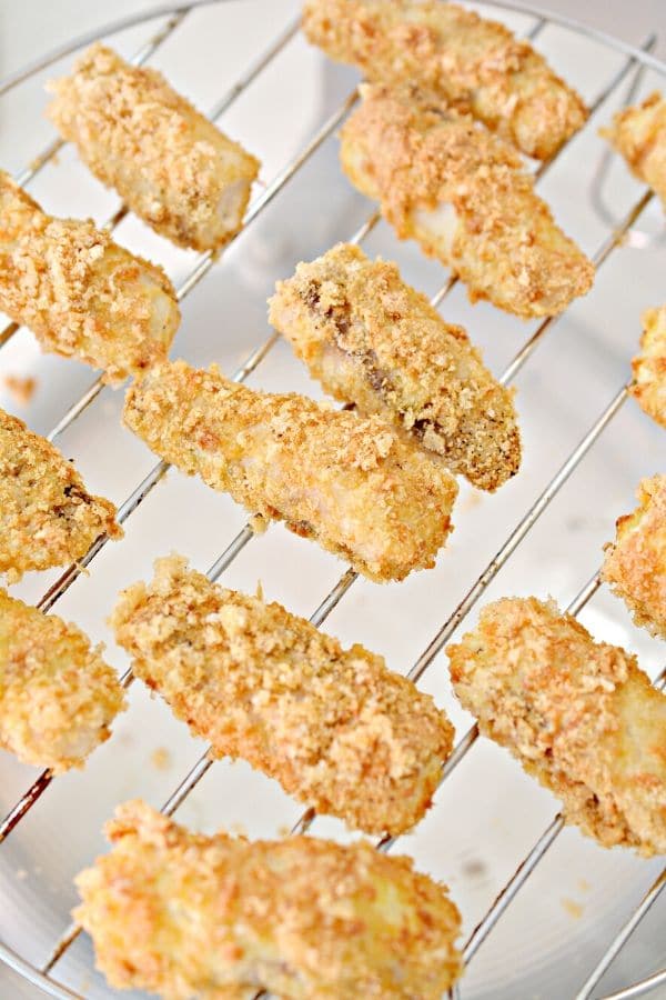 air fried fish sticks on an air fryer rack