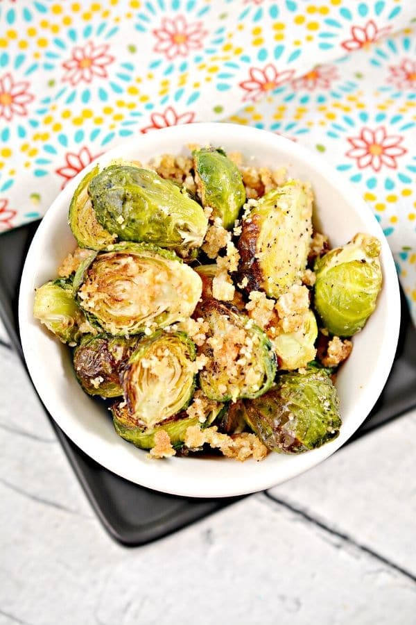  crispy brussel sprouts in a bowl on table 