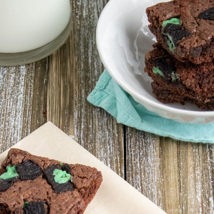 wood table with brownies on it 