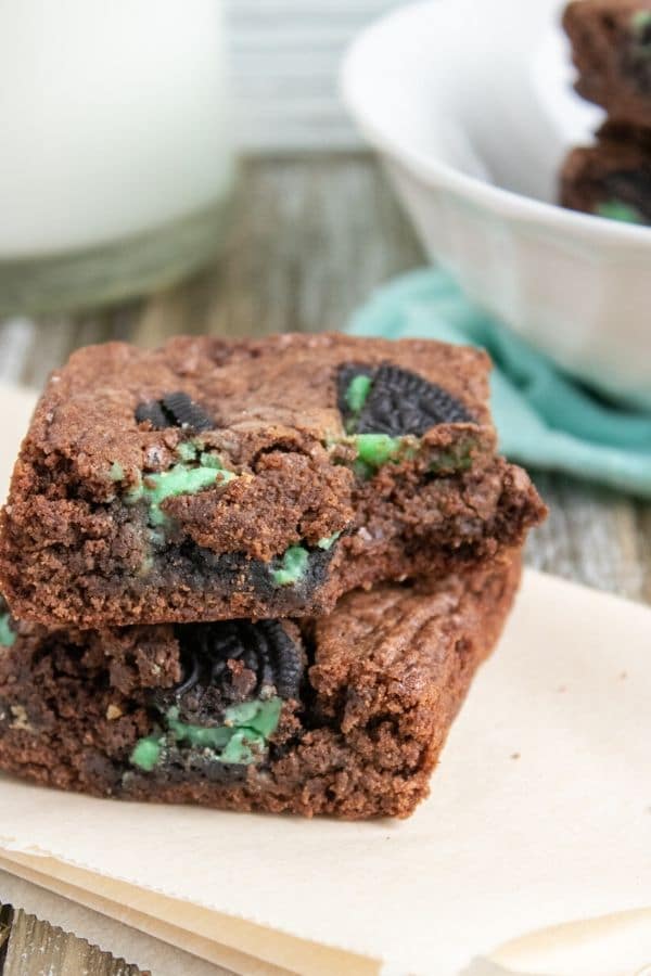 mint brownies stacked on top of each other 