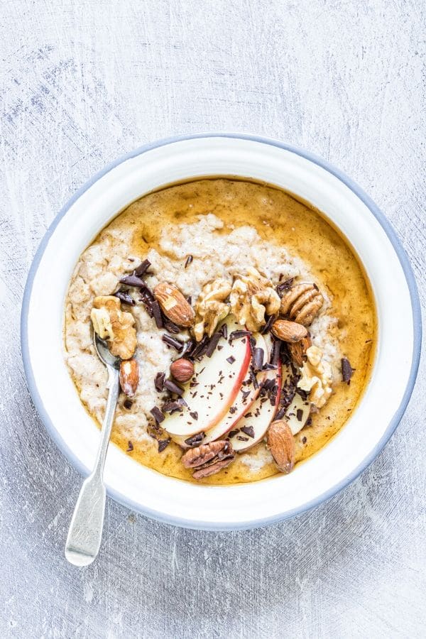 bowl of instant pot apple oatmeal with metal spoon 
