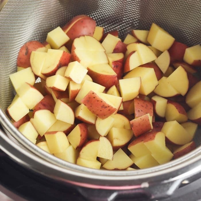 red potatoes diced and sitting in instant pot 