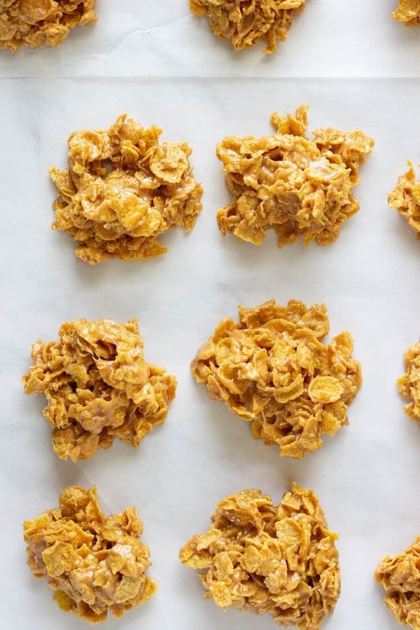 peanut butter cornflake cookies on parchment paper