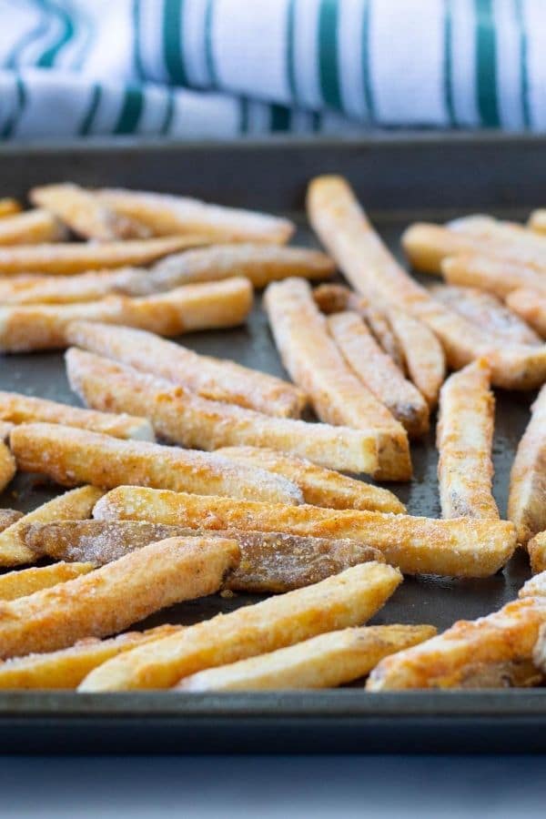 frozen french fries on cookie sheet