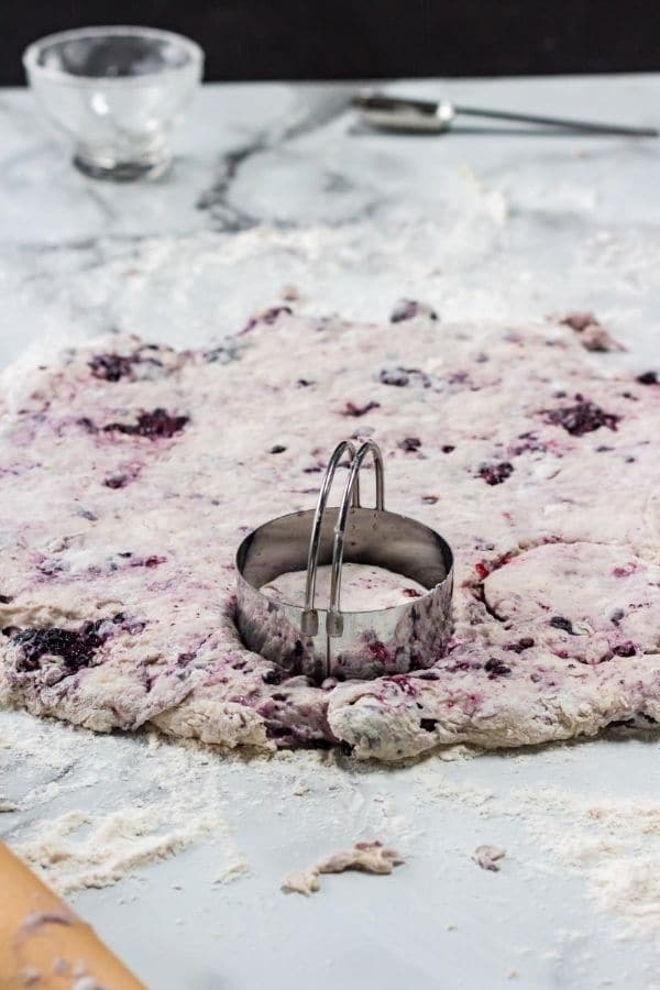 fruit biscuits dough being cut 