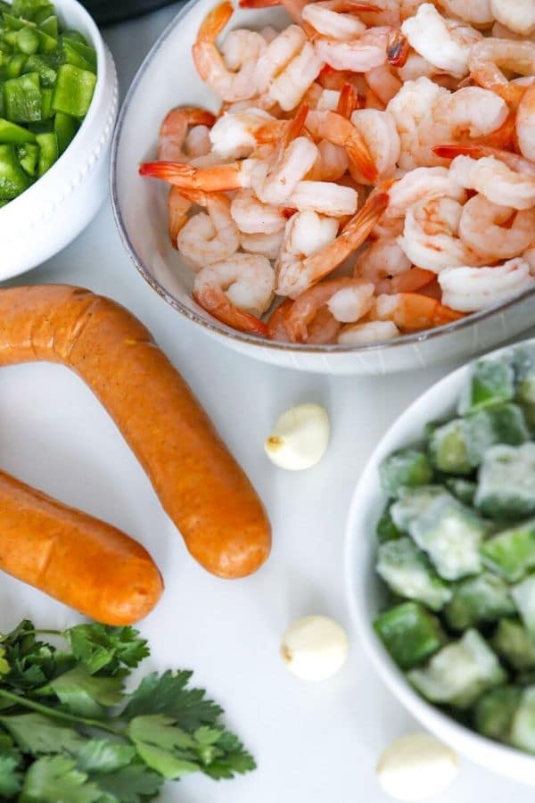 shrimp, kielbasa, and other veggies on a table