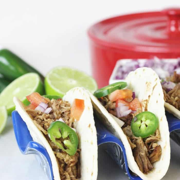 pork carnitas in taco holders 