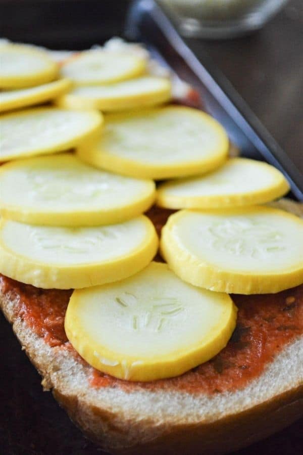 sliced summer squash on french bread pizza