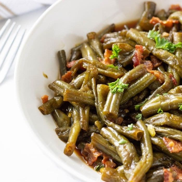 green beans and bacon in a bowl 