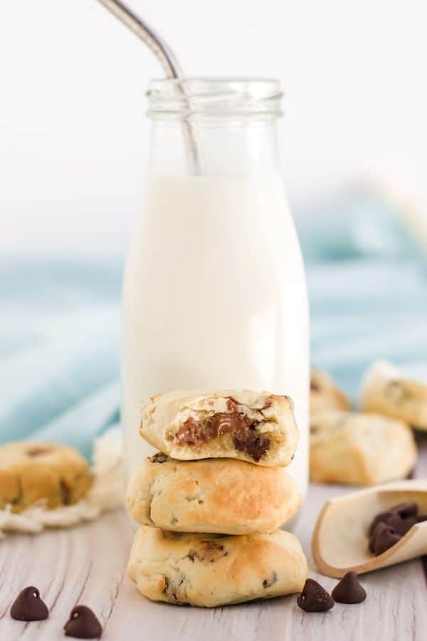 chocolate chip cookies stacked on table 