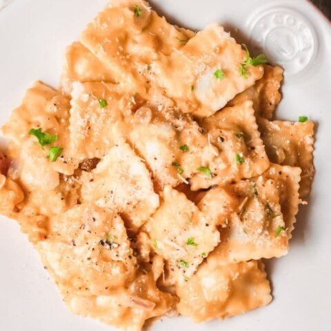plate of creamy pasta on white plate