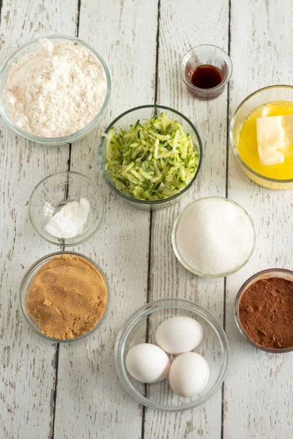 ingredients for zucchini dessert on wooden counter 