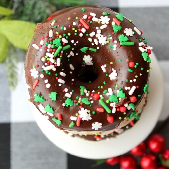 overview of Christmas donuts on a cupcake stand