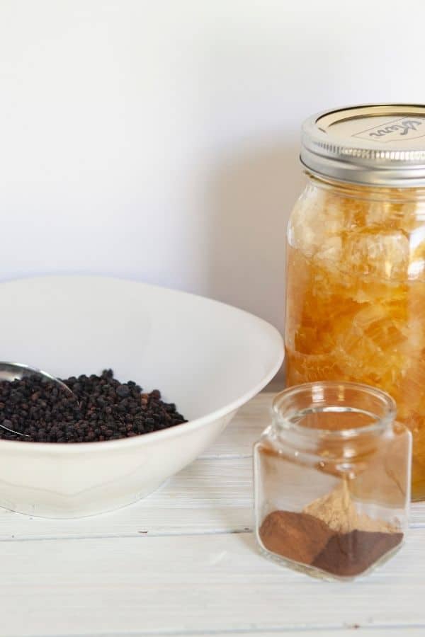 elderberry syrup  on a table