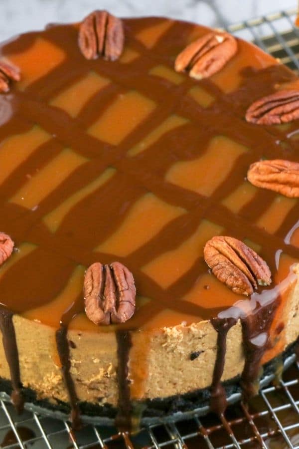 turtle cheesecake on a cooling rack