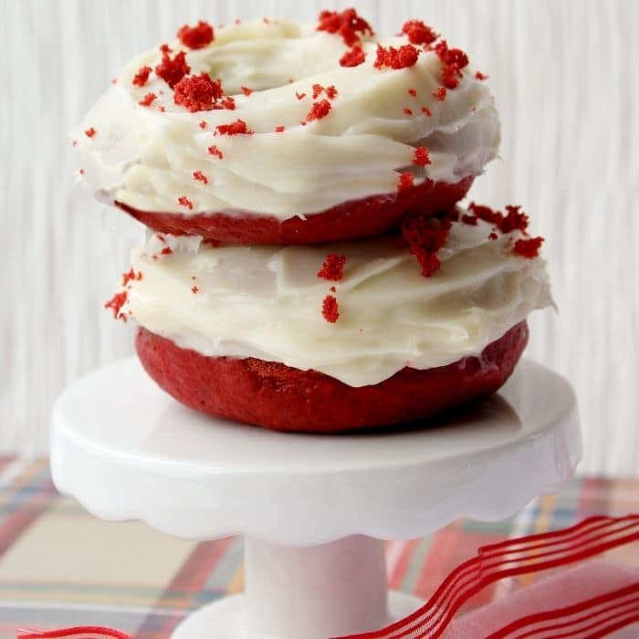 stacked red velvet donuts on cupcake stand