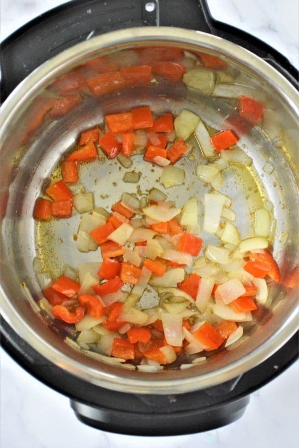 sauting pepper and onions 