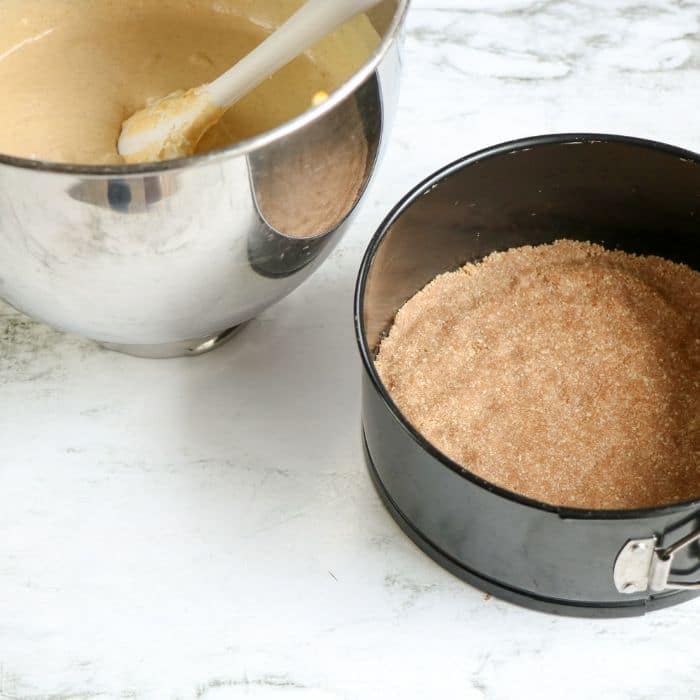 cheesecake crust, and bowl of cheesecake batter