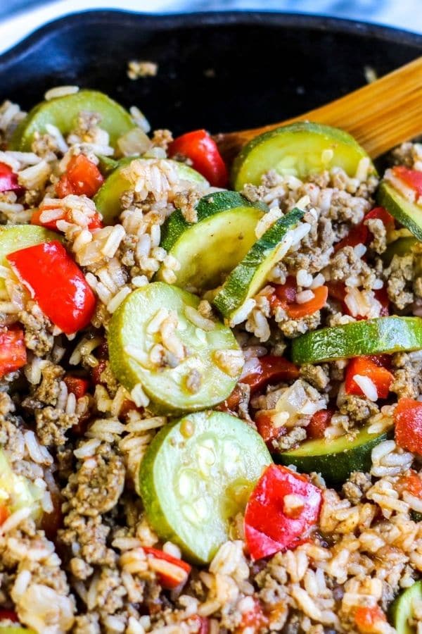 pan full of rice and ground beef cassserole with zucchini 