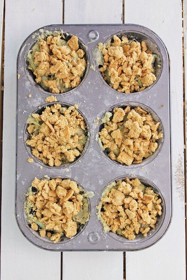 cinnamon toast crunch muffins in muffin tin