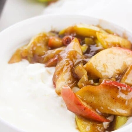fried apples in a bowl with ice cream