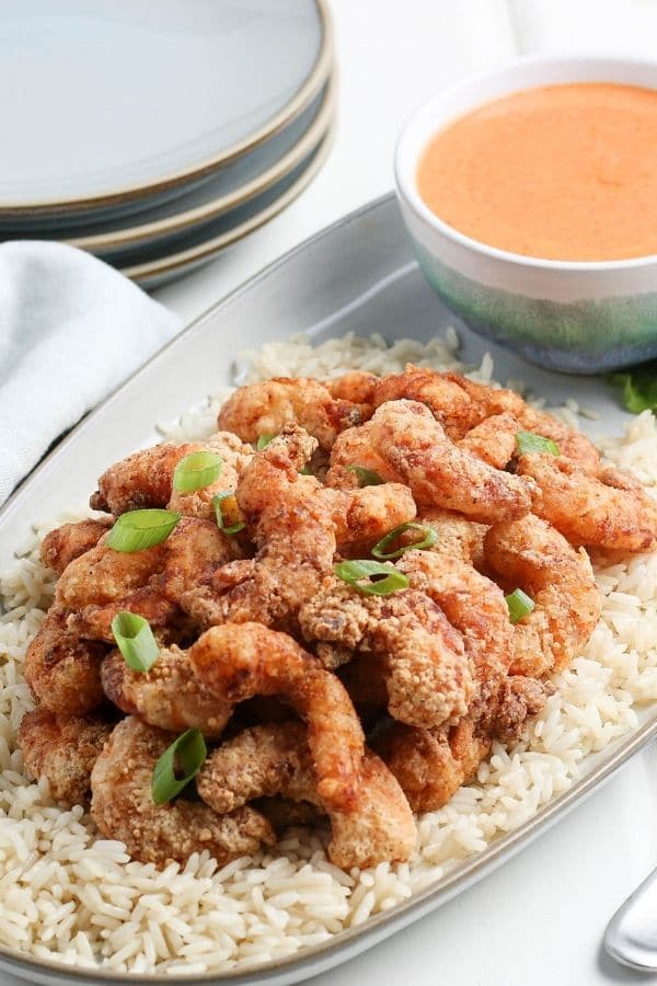 fried shrimp on a bed of rice 