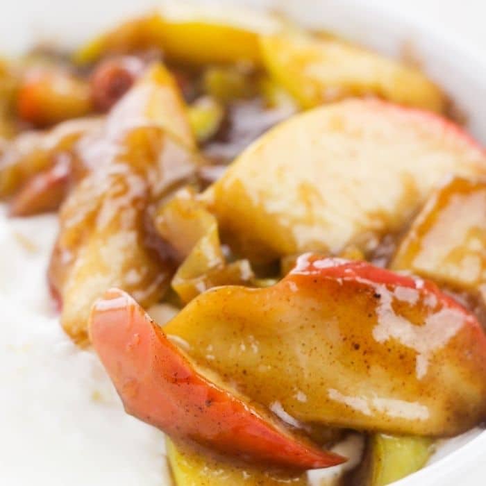 fried apples in a bowl with ice cream 