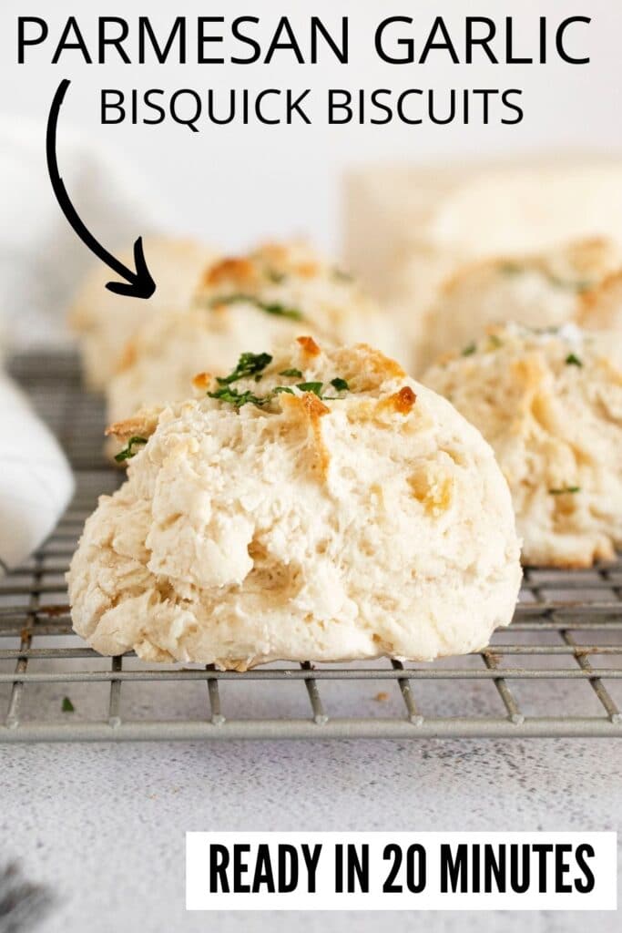 Parmesan Garlic Biscuits on cooling rack with words saying what the food is 