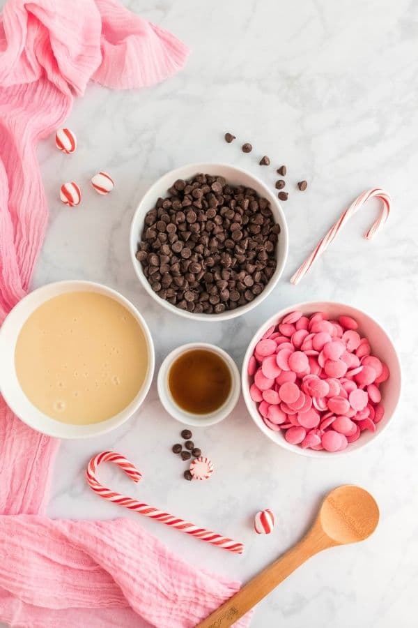 ingredients for peppermint fudge in bowls on counter