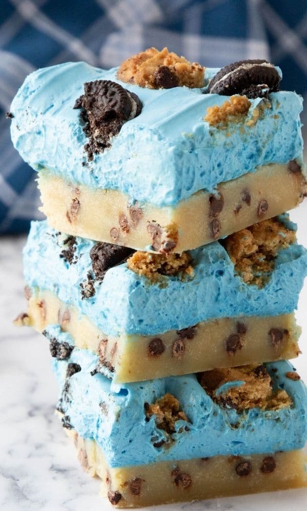 cookie monster dessert bars stacked on top of each other 