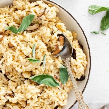risotto in a bowl with sage on top