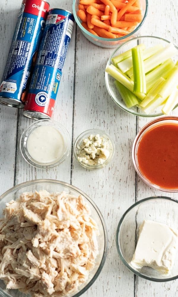 buffalo chicken appetizer ingredients on wooden counter 