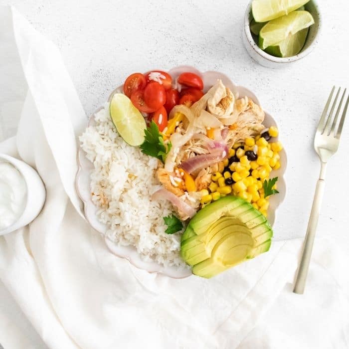 chicken fajita bowl on white table counter 