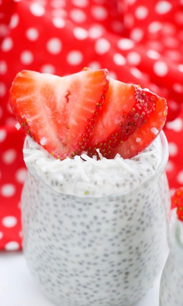 creamy chia pudding with strawberries on top 