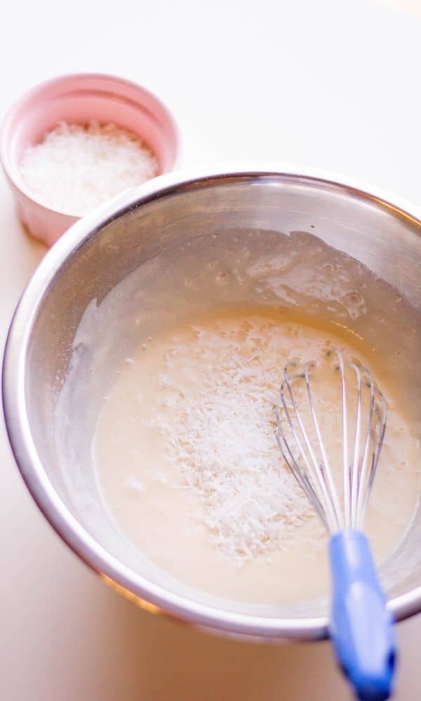 whisking cake mix in a bowl