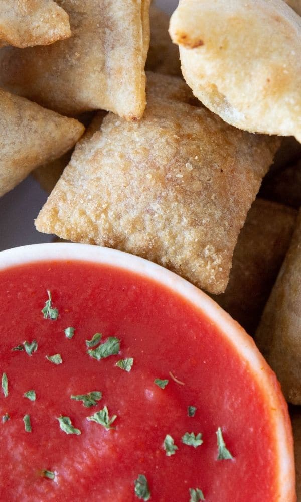 pizza rolls with sauce on platter