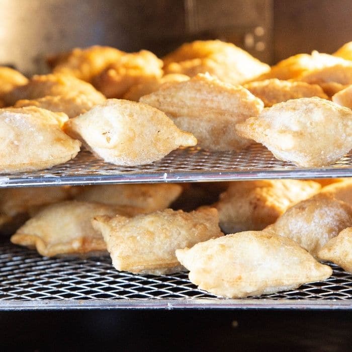 picture of pizza rolls on air fryer oven trays 