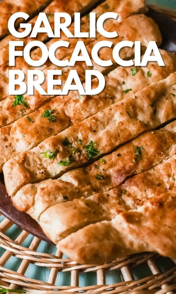 garlic bread on counter with words written on top 