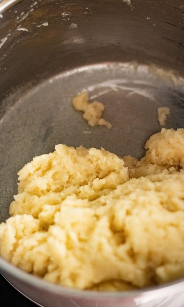 cream puff mixture in saucepan on stove