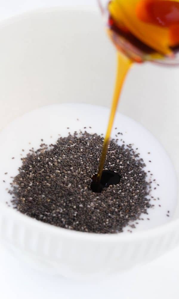 maple syrup being pulled in chia mixture 