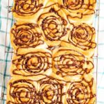 chocolate chip cinnamon rolls in a baking pan