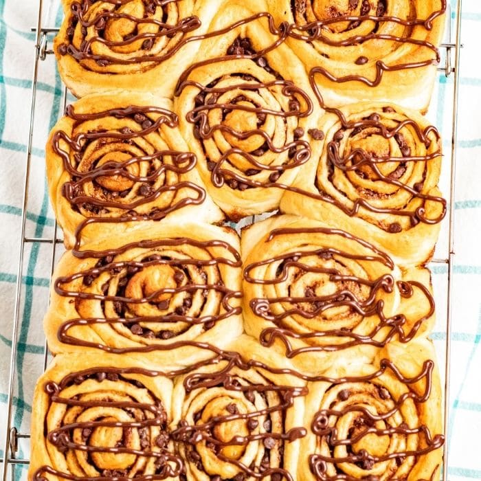 chocolate chip cinnamon rolls in a baking pan 