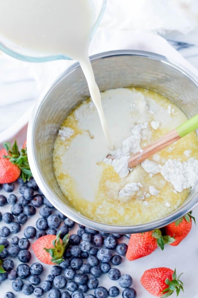 mixing pancake batter in a bowl 